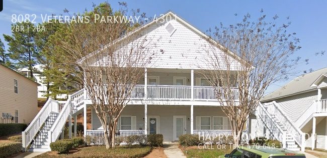 Building Photo - 8082 Veterans Pkwy Unit 4301