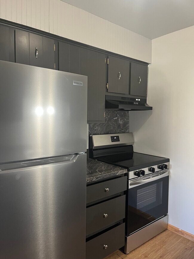 New kitchen appliances - 716 Rhodes St Apartments Unit 3