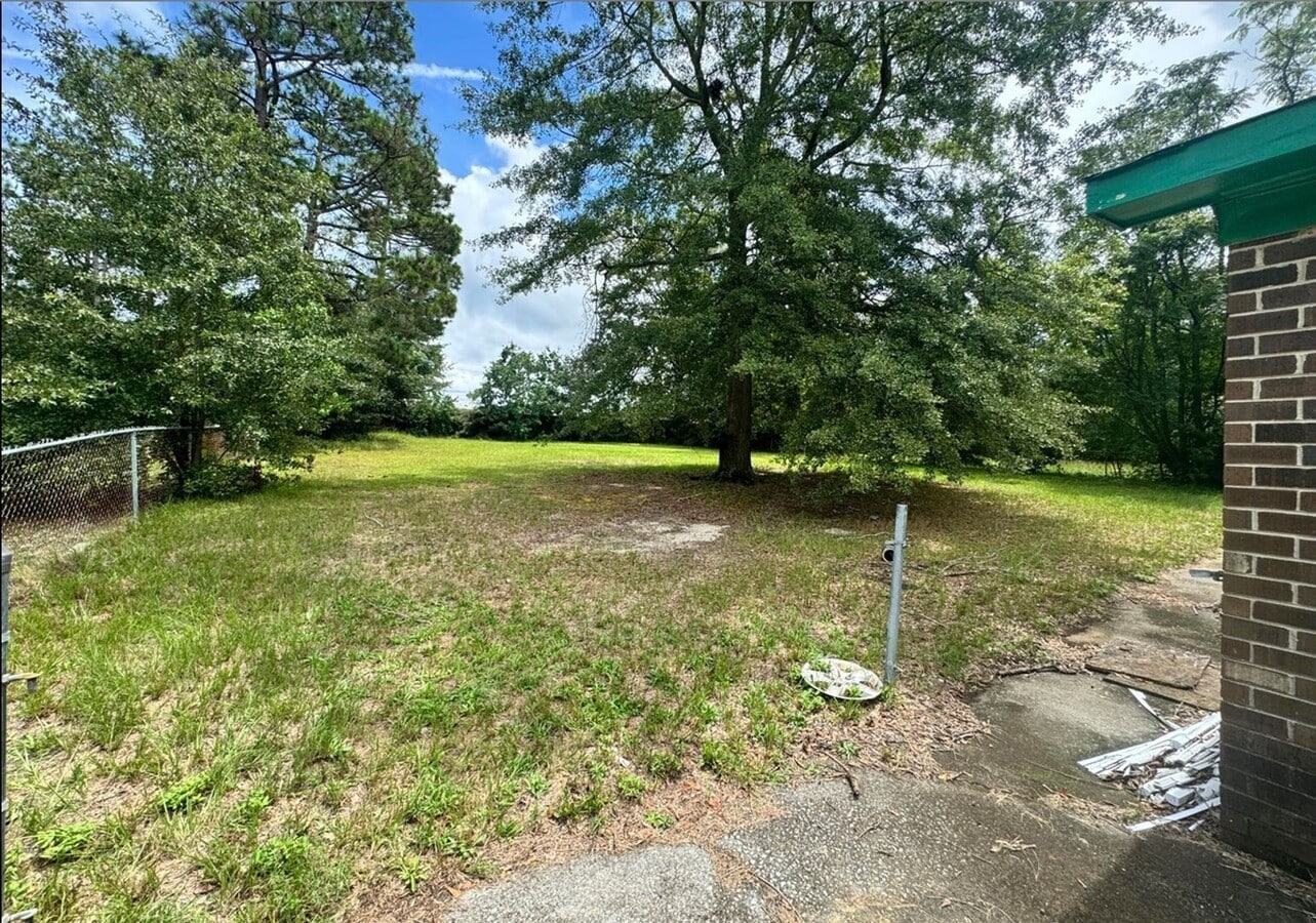 Photo - Charming 4-Bedroom Home in a Great Neighborhood with a Spacious Yard!