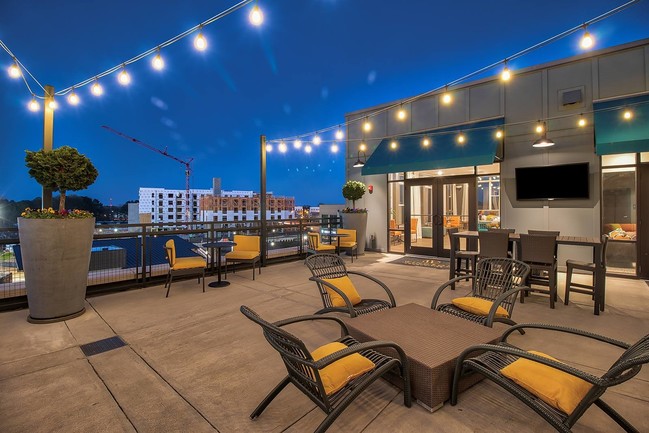 Our outdoor pavilion with TVs and dining areas