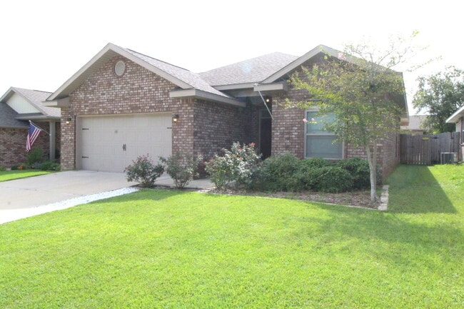 Photo - Beautiful 3BR/2BA Brick Home with Granite Kitchen, Covered Patio, Fire Pit & 2-Car Garage Near I-10