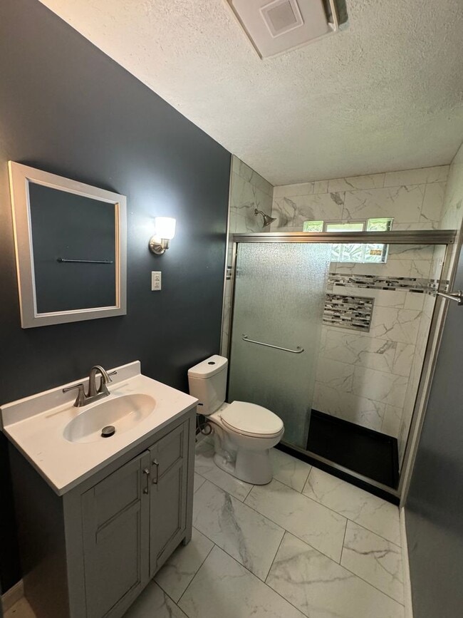 Photo - Charming 3-Bedroom, 1-Bathroom Home with Attached Garage – Accepting Section 8