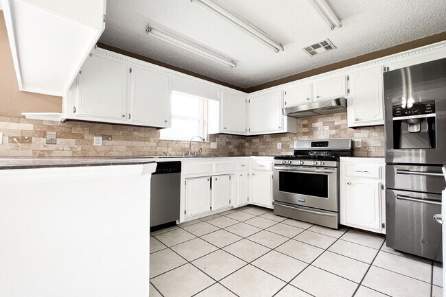 Photo - Massive 4BD/2BTH and 2 Car garage Home! Mi...