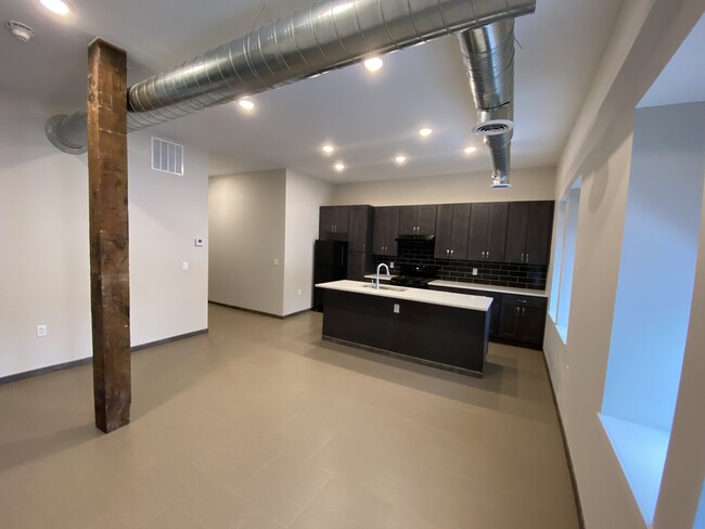 Living Space looking into Kitchen - 67 State St Apartments Unit B