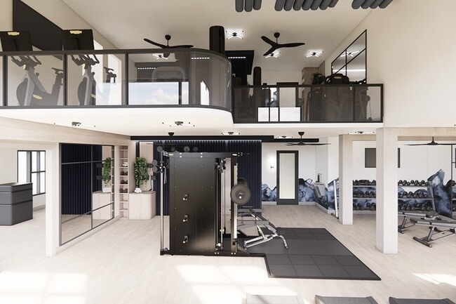 Two-story, fully-equipped fitness club featuring Technogym equipment