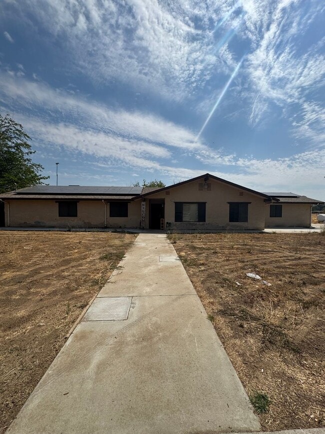 Building Photo - Spacious 4 Bedroom, 2 Bath Home with Solar...