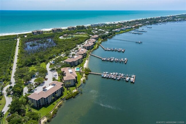 Building Photo - 4540 NE Sandpebble Trce Unit 203