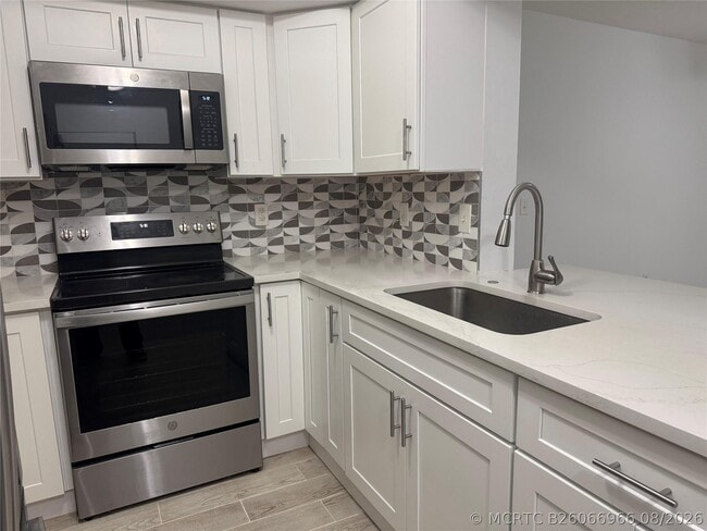 Building Photo - 5620 NW 61st St Unit 1201