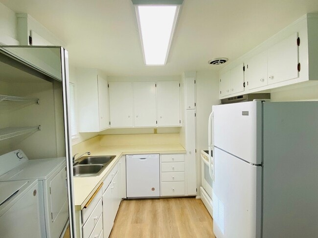 Photo - Charming 2-Bedroom Apartment at Fowler Court with In-Unit Washer/Dryer & Extra Storage Unit 4