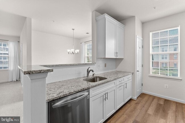Building Photo - 42470 Pennyroyal Sq Unit 204