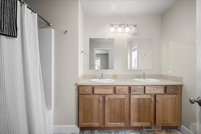 Photo - Spacious 3BR/2.5BA Furnished Townhome | Pet-Friendly with Large Fenced Yard & Ample Parking