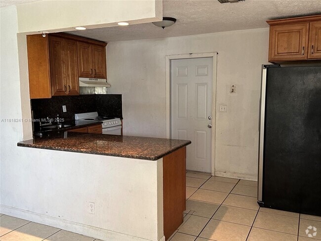 Building Photo - 5720 SW 36th Ct Rental