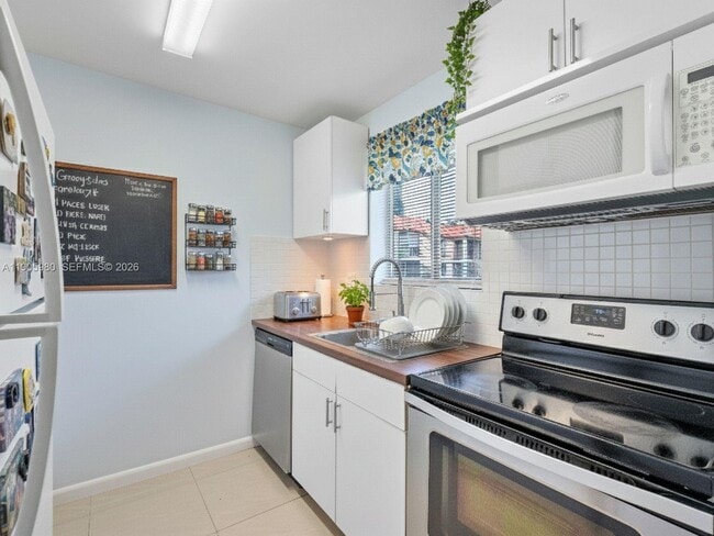 Building Photo - 6060 Forest Hill Blvd Unit 103