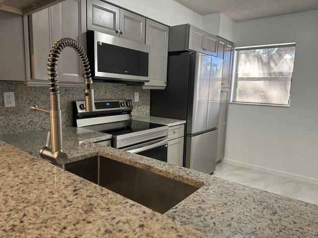 Building Photo - 3130 Millwood Ter Unit 1130