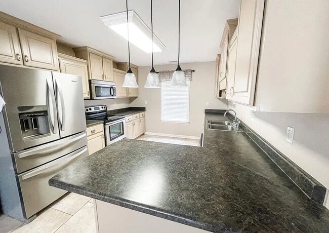 Photo - Charming 3/2 furnished home on quiet street