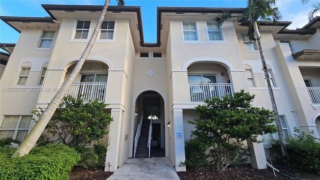 Building Photo - 11401 NW 89th St Unit 214