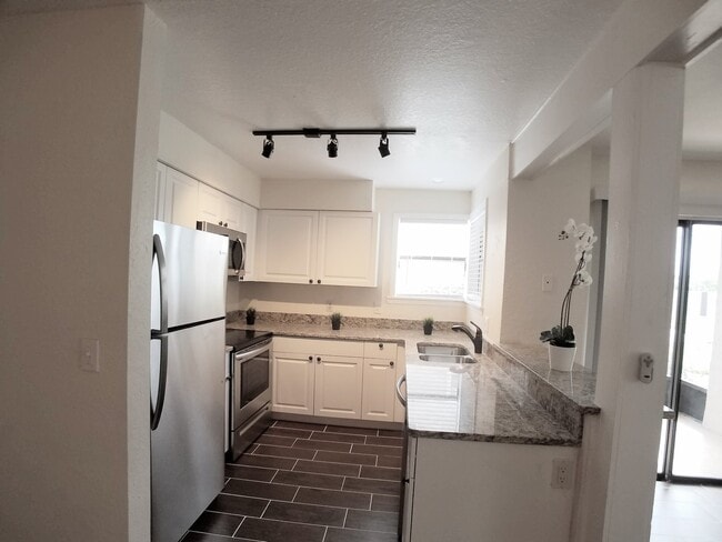 Building Photo - FOR RENT! Gorgeous First Floor Remodeled 2... Unit 163 Rental