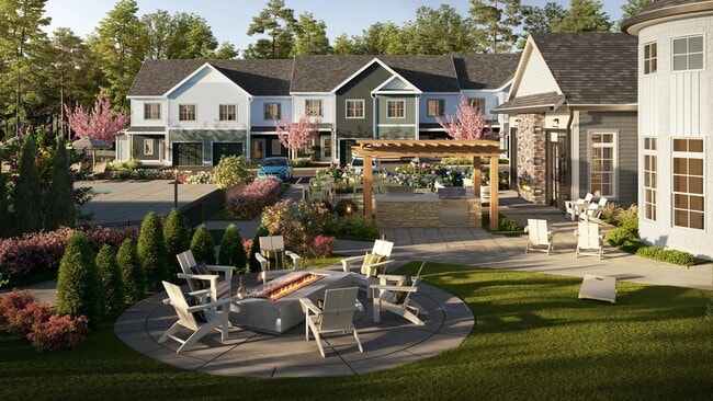 Activity lawn with outdoor games, firepit, grills, and comfortable seating. - Modera South Shore
