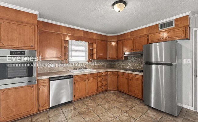 Photo - 2 Bed, 2 Bath Home with Garage / Pet-Friendly / Vouchers Accepted / Available Now!