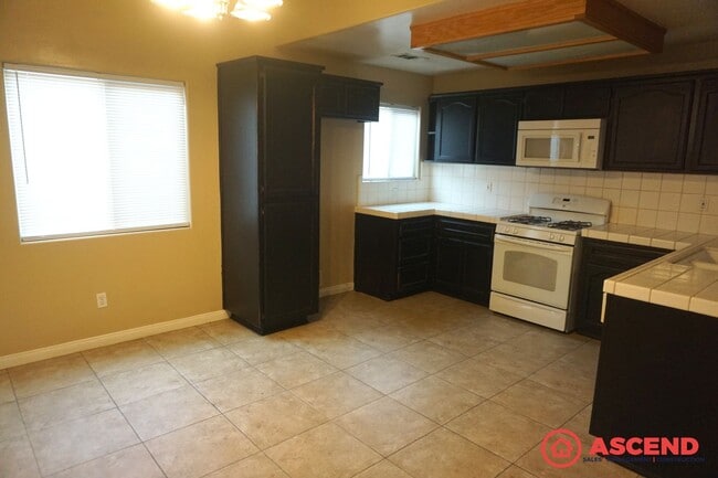 Photo - Spacious 4 Bedroom Home with Fenced Backyard & Garage