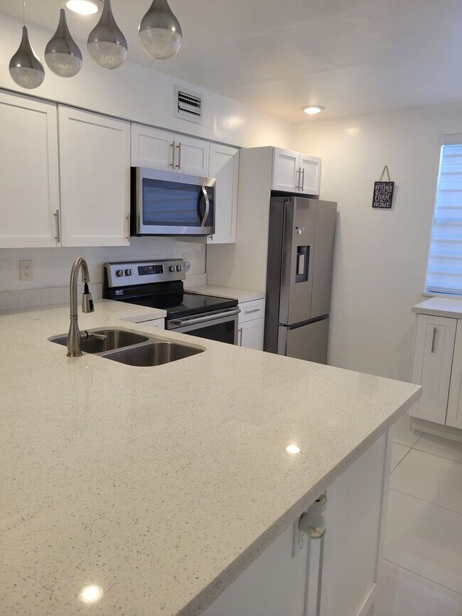 Photo - Beautifully renovated 2/2 condo in gated community
