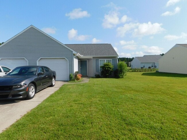 Building Photo - Charming 2-Bedroom, 2-Bath Duplex with Garage