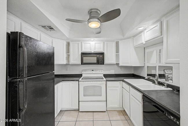 Building Photo - 1402 S Jentilly Ln Unit 205