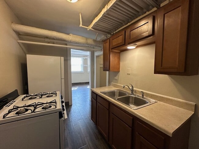 Photo - Freshly Renovated 2BR Garden Apartment Near UWM $1,350/mo – Heat Included