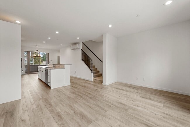 Photo - Modern 3 Bed 3.5 Bath Townhome with Garage, Balcony and Fenced Yard Near Light Rail