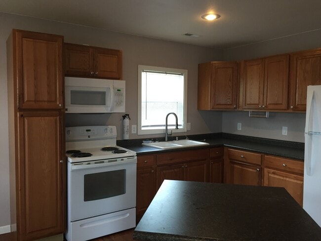 Photo - Charming 2-Bedroom Home with Porch & Stora...