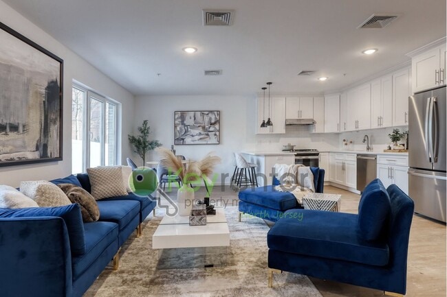 Photo - Modern New Construction 2 Bedroom Townhome with Garage & Driveway — First Occupancy!