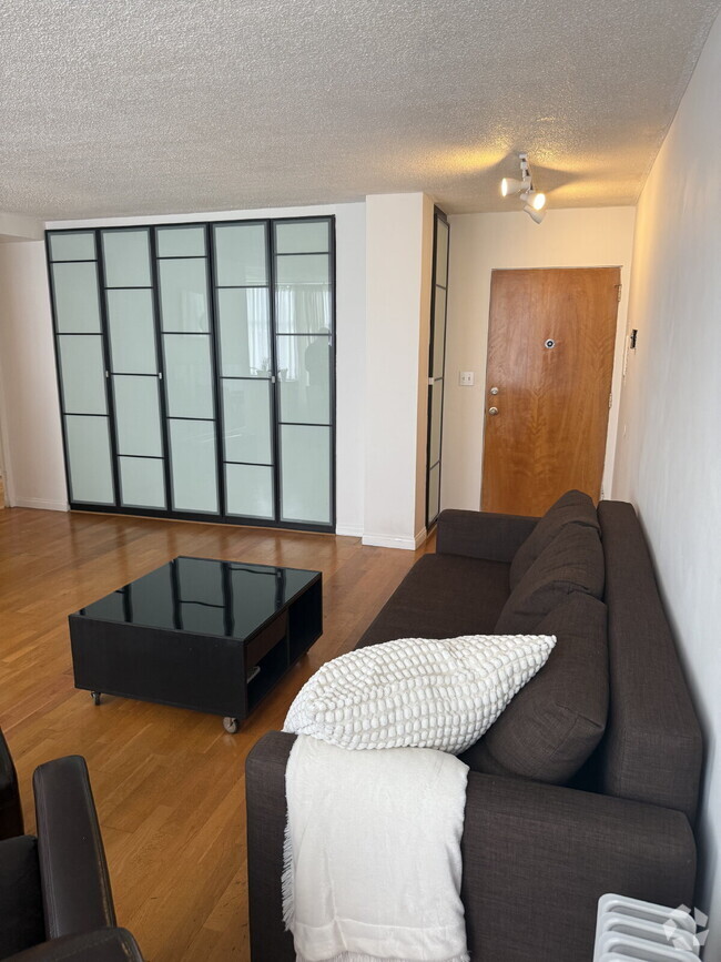 Building Photo - "Partial Furnish Coastal Living: 2-Bed Con... Unit 212 Rental
