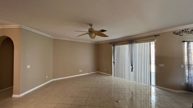 Photo - Spacious 4/3.5 Pool Home with Water View & 3-Car Garage in Lee Vista Area (close to Lake Nona)
