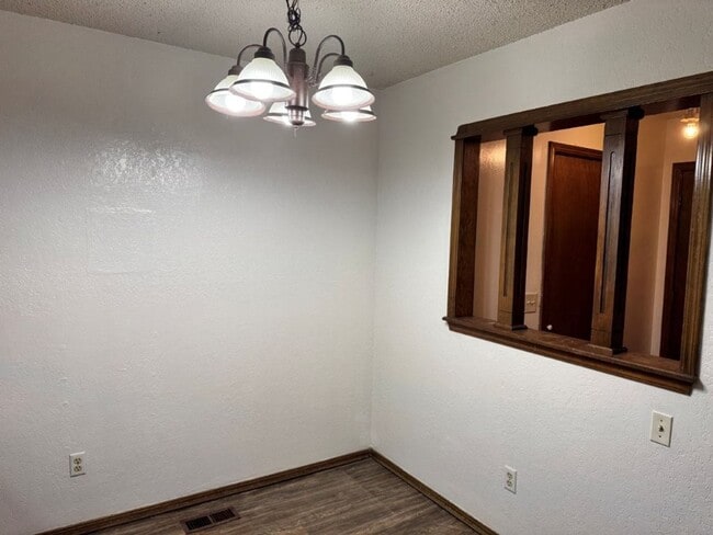 Photo - 2 bed 2 bath duplex refreshed with new flooring and bathroom countertops and paint, spacious and ...