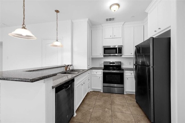 Building Photo - 6122 W Mt Houston Rd Unit A/B/D