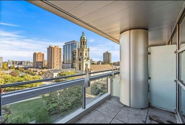 Large Covered Balcony with peak view of lake - 545 E Wells St Unit Cathedral Square Condos