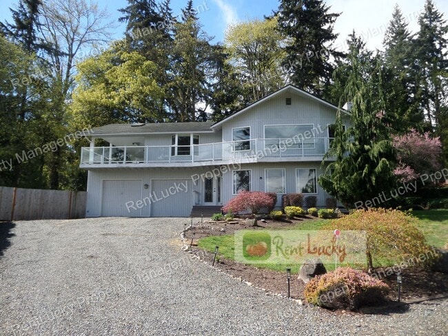 Building Photo - LAKE VIEWS!! Incredible 4-Bedroom Home on Huge Lot w/Giant Covered Deck!