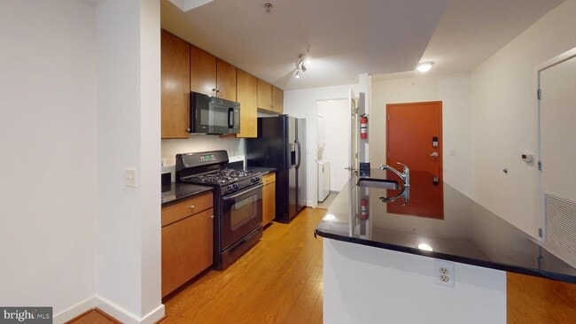 Building Photo - 1117 10th St NW Unit 509