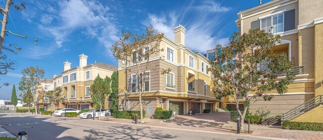 Building Photo - Stunning Upgraded Tri-Level Condo in South Coast Metro’s Exclusive Vantage Community