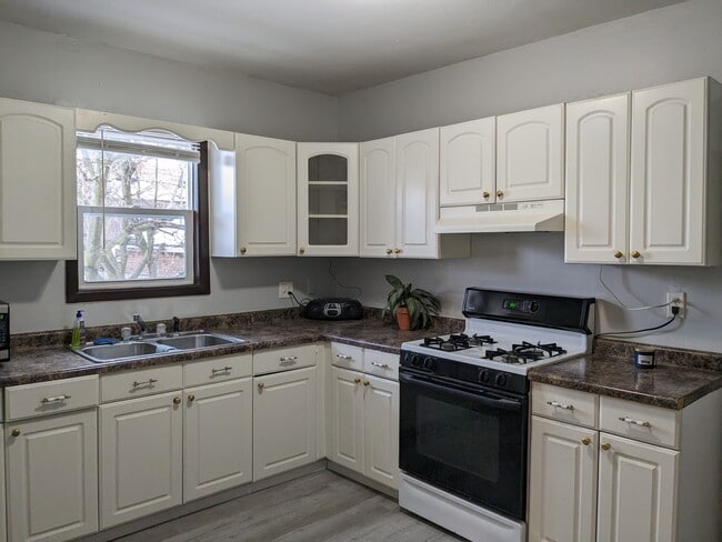 Building Photo - 6013 12th Ave Unit #1 2 Bedroom
