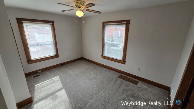 Photo - Charming 3BR Home in Norwood with Fenced Yard, Detached Garage & Workshop – Prime Location!