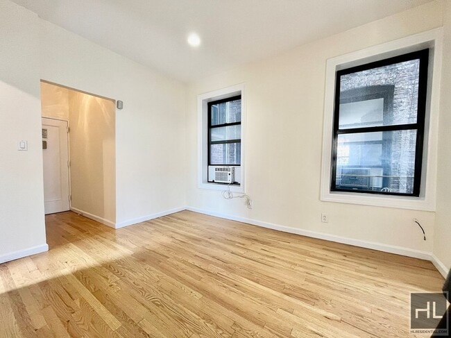 Building Photo - East 12th Street Unit 63