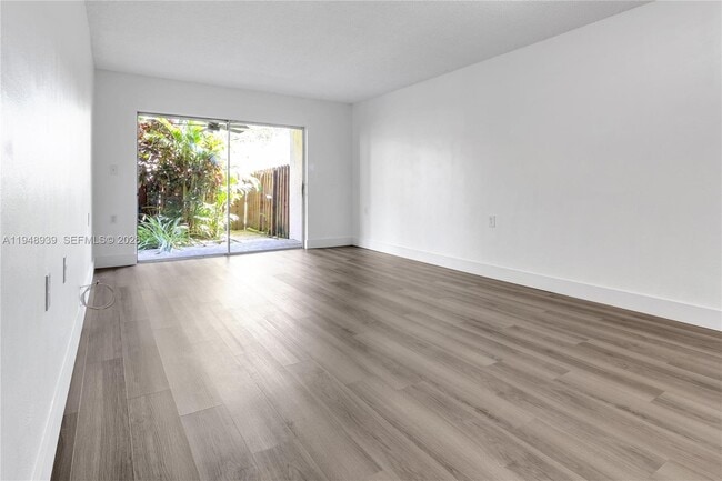 Building Photo - 11273 SW 88th St Unit 116J