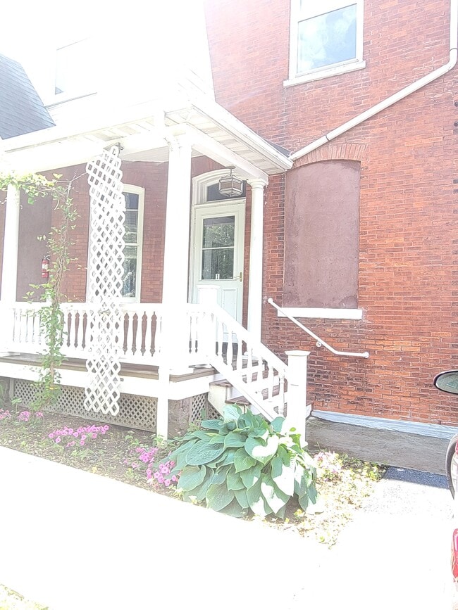 Private entrance w/small porch - 405 E Main St Unit First Floor Apartment