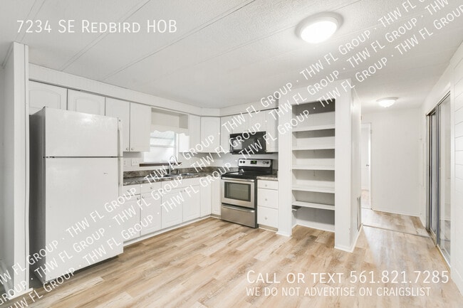 Building Photo - 7234 SE Redbird Cir