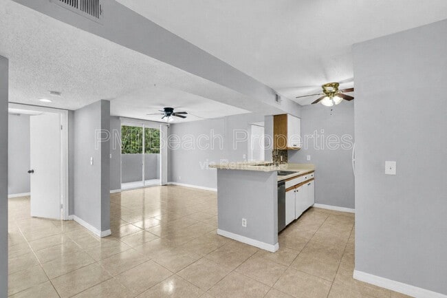 Building Photo - 3995 W McNab Rd Unit 205b