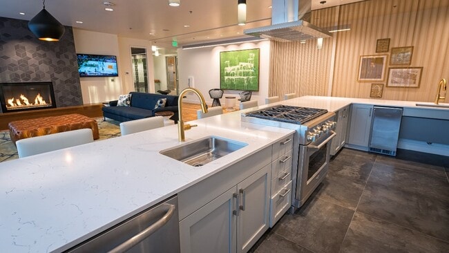 Cozy up by the fire or host friends for dinner in this resident lounge