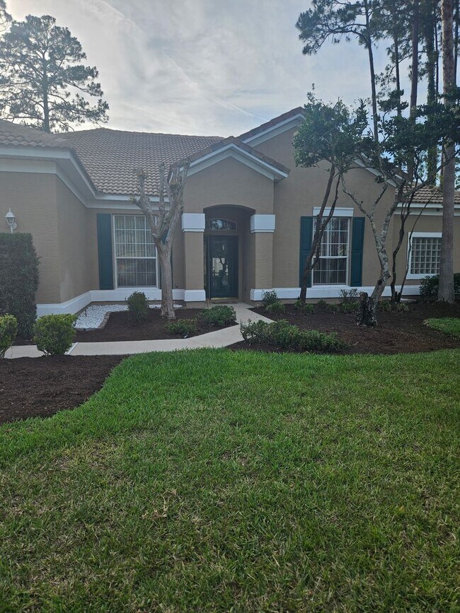Photo - 4 BEDROOM 3 FULL BATH HOME WITH A SCREENED IN POOL IN THE BEAUTIFUL PALM COAST