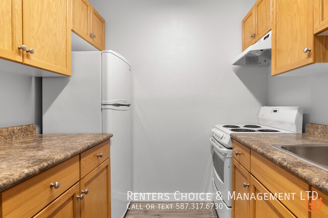 Photo - Main Floor Unit, Assigned Parking, Onsite Laundry, BONUS INCENTIVE
