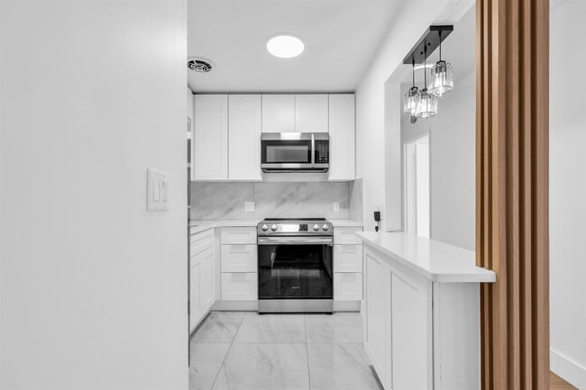 Building Photo - 1901 John F. Kennedy Blvd Unit 202